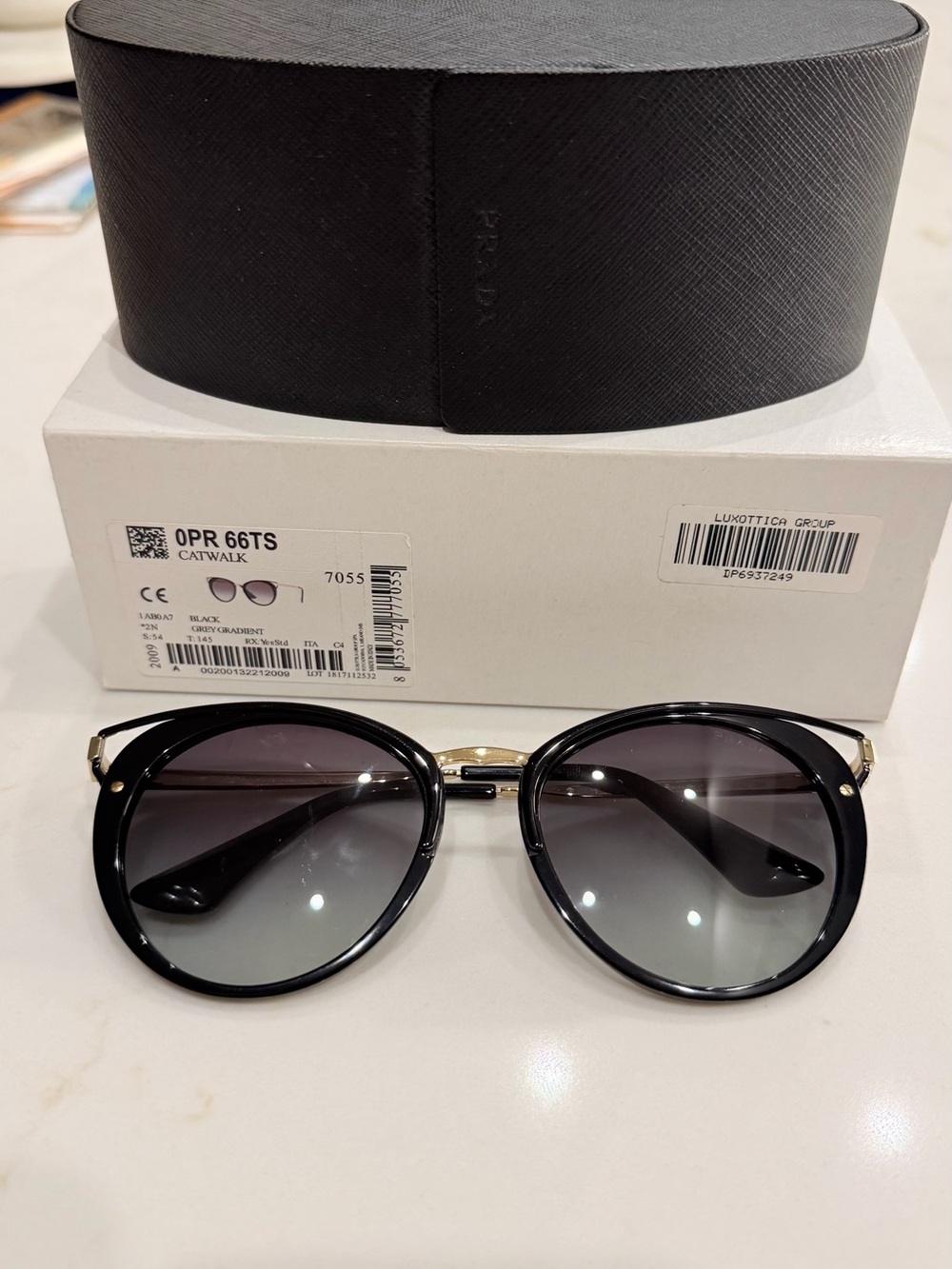 Prada Black Frame Sunglasses with Gray Gradient Lenses